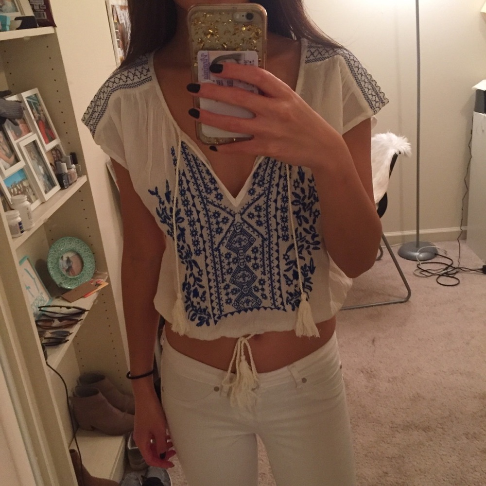 White and blue embroidered top